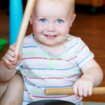 kid playing drum